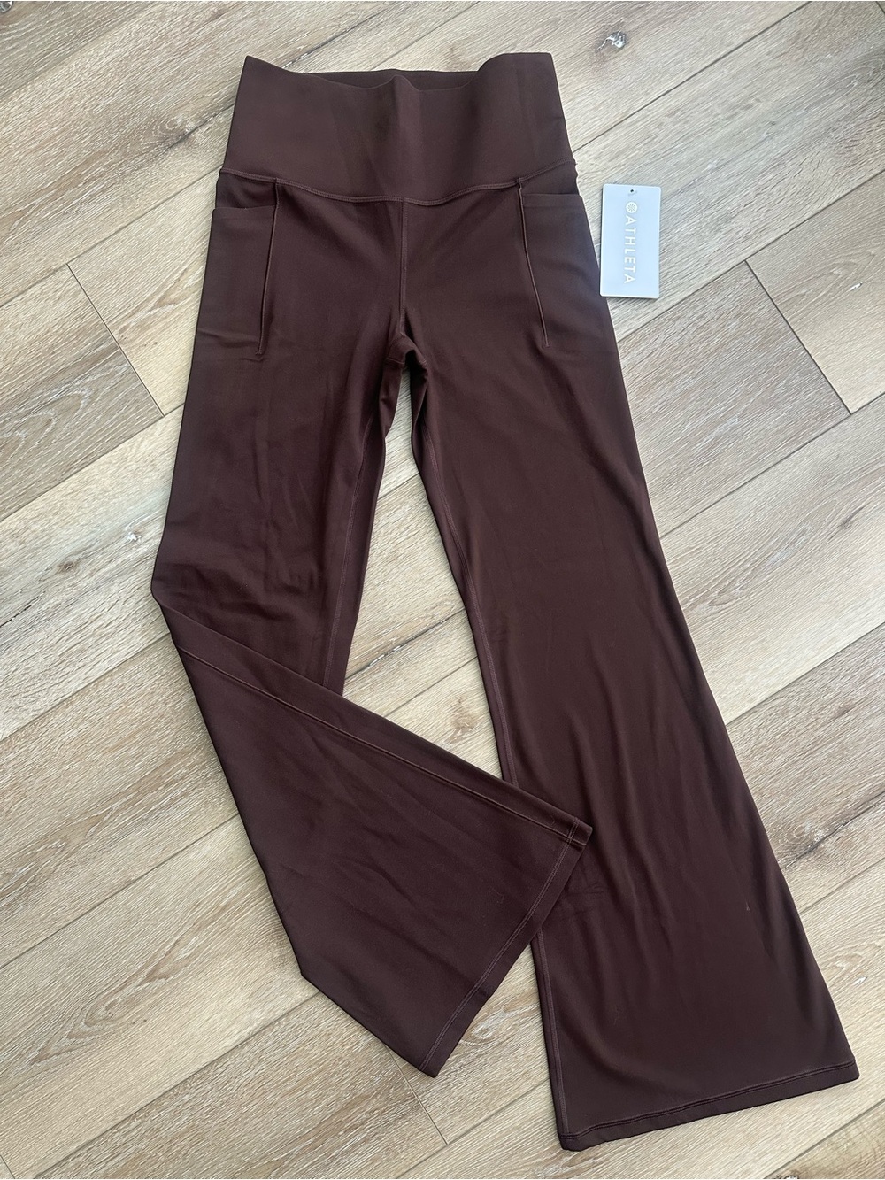 NWT Athleta Salutation Stash Brown Flare leggings - Picture 2 of 3
